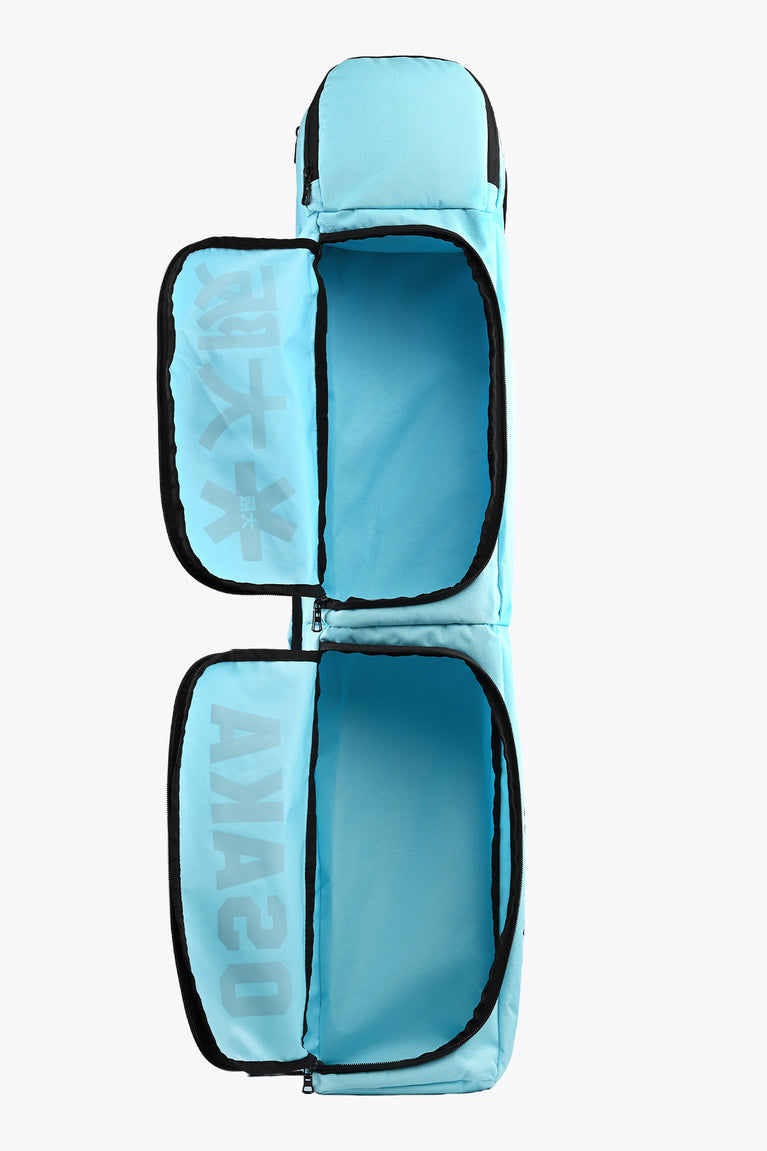 Blue Topaz stickbag with two open padded compartments and mesh logo side pocket
