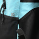 Light blue and black backpack side pocket with zipper and attachment loop