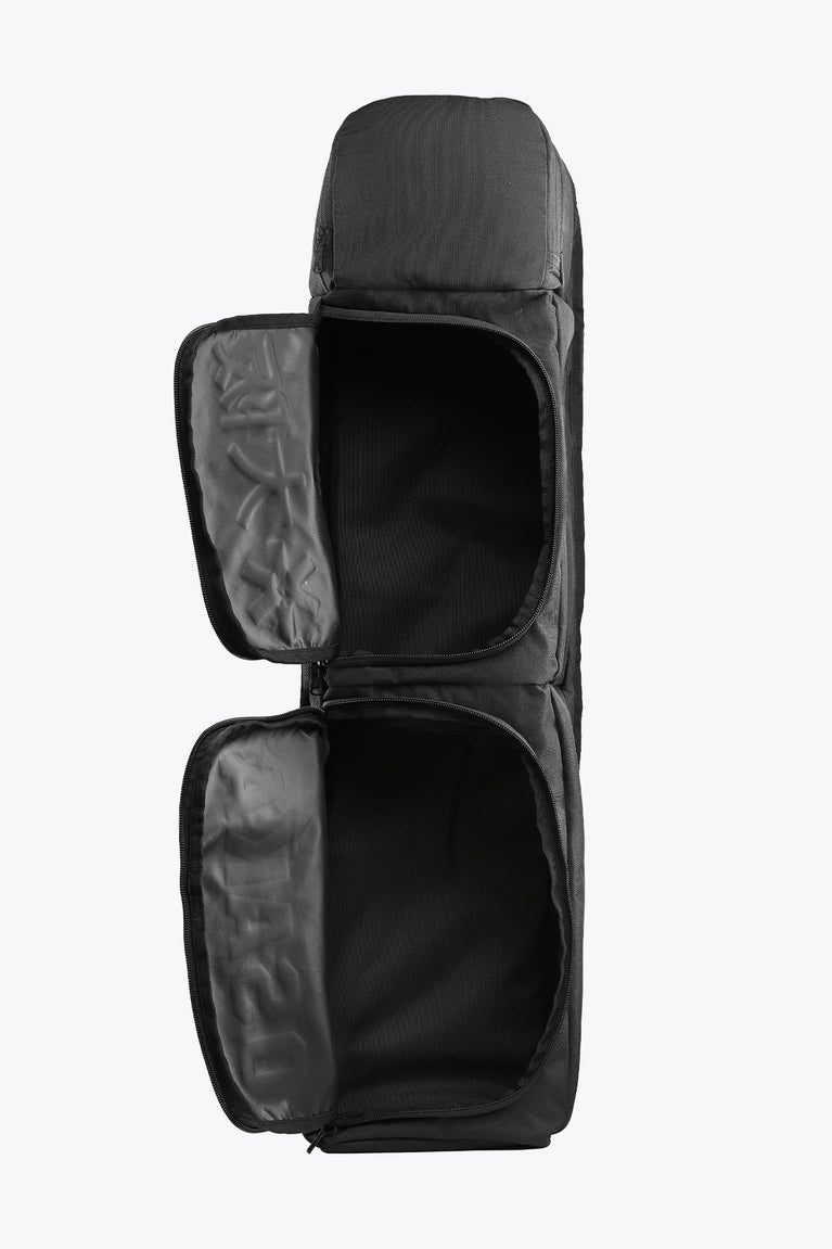 Kids stickbag small black with open double compartments and gray interior lining.