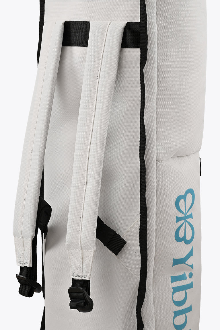 Stickbag interior: white padded dividers with black strap loops and clips