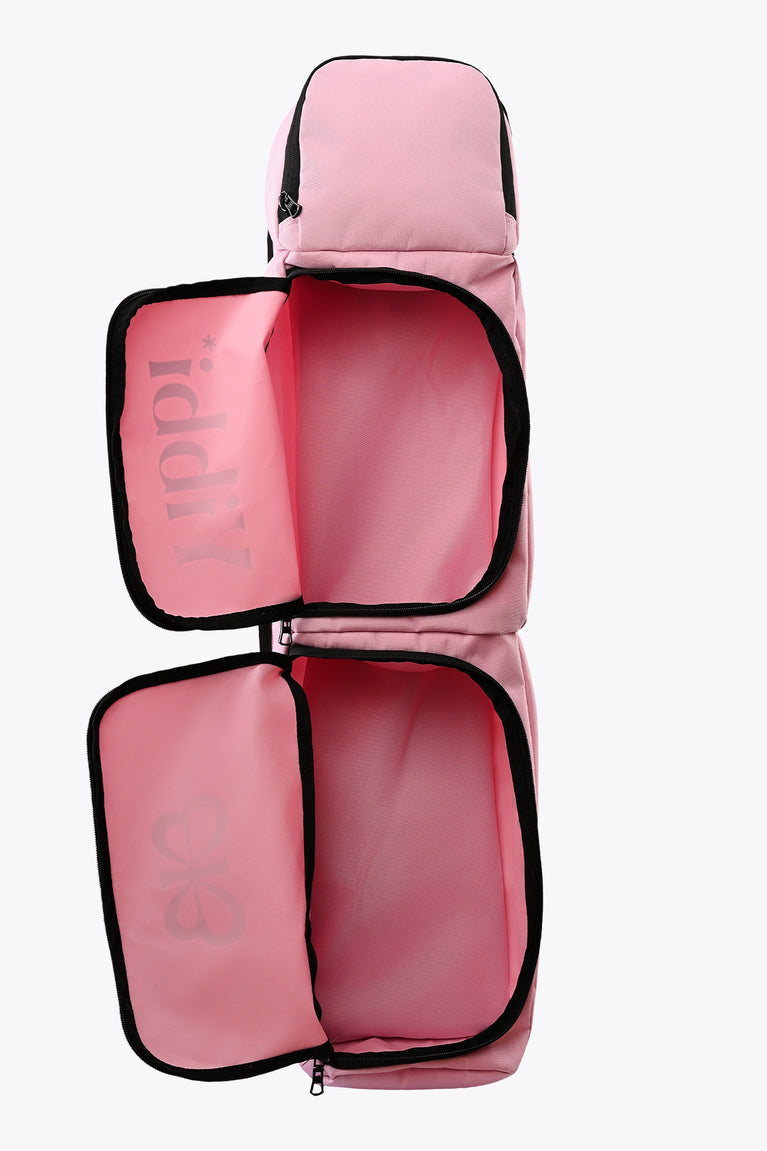 Small pastel pink sports stickbag with open front and three inner zip compartments
