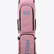 Large pastel pink hockey stick bag with black trim and two stick sleeves