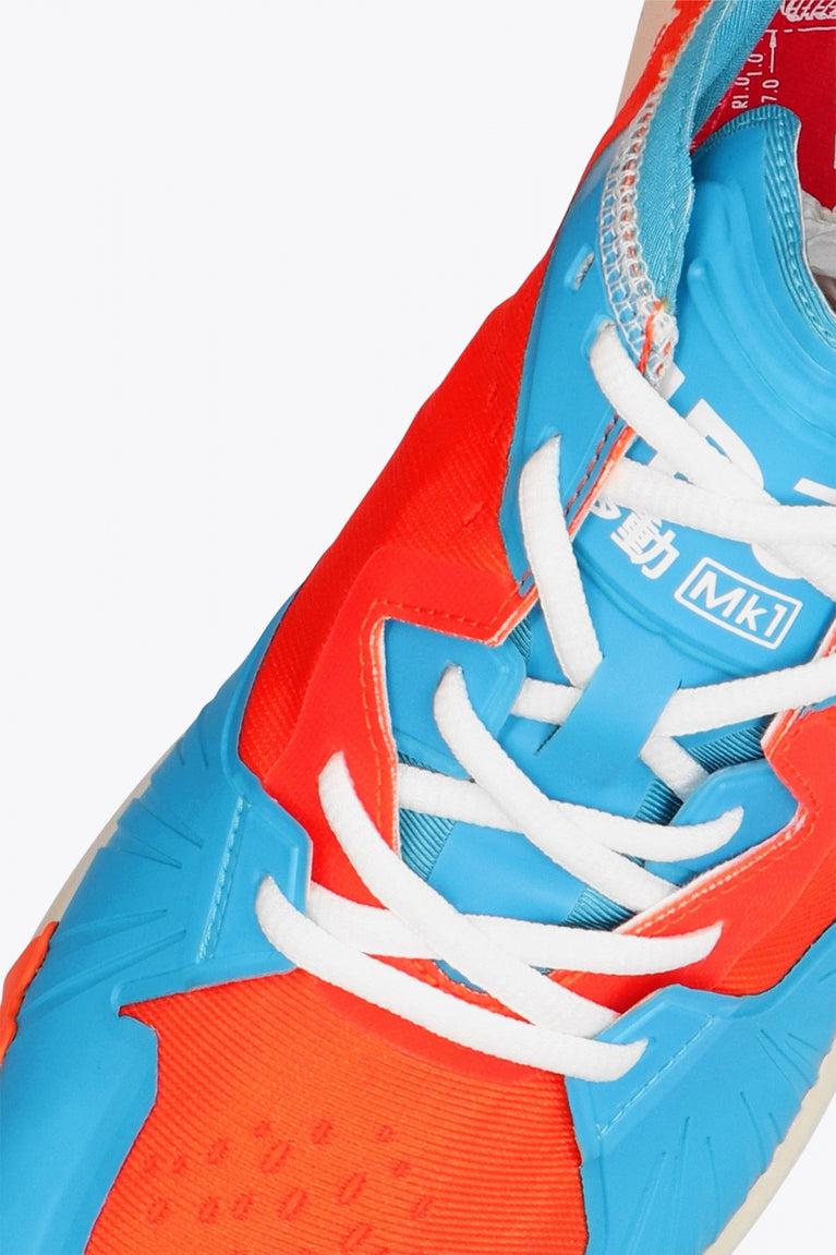 Osaka footwear Ido Mk1 in orange and blue with logo in white. Detail shoelace view
