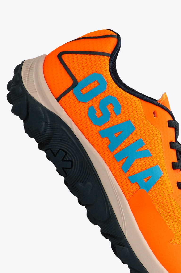 Osaka footwear Kai Mk1 in orange with logo in blue. Detail logo view