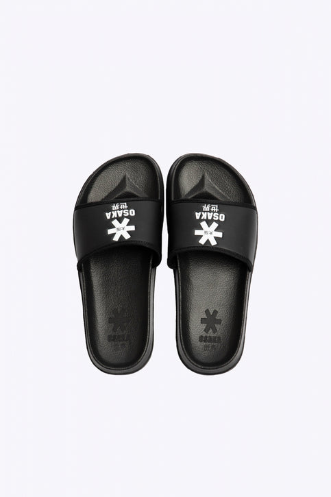 Osaka slippers black with logo in white. From above view