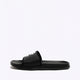 Osaka slippers black with logo in white. Side view