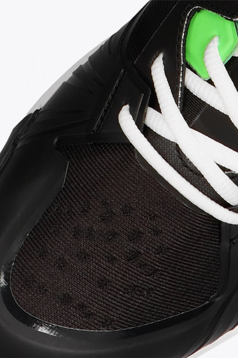 Osaka footwear Ido Mk1 in black and green with logo in black. Detail shoelace view