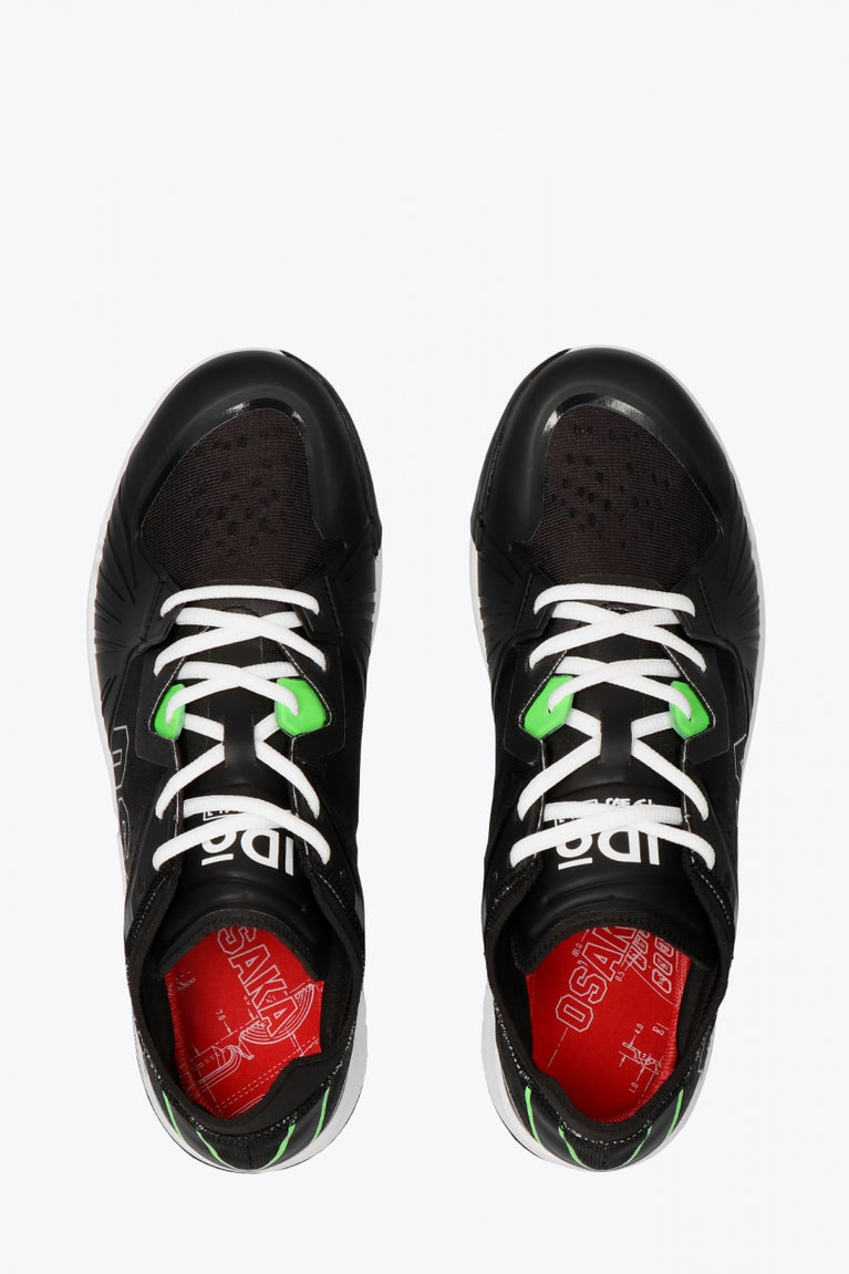 Osaka footwear Ido Mk1 in black and green with logo in black. From above view