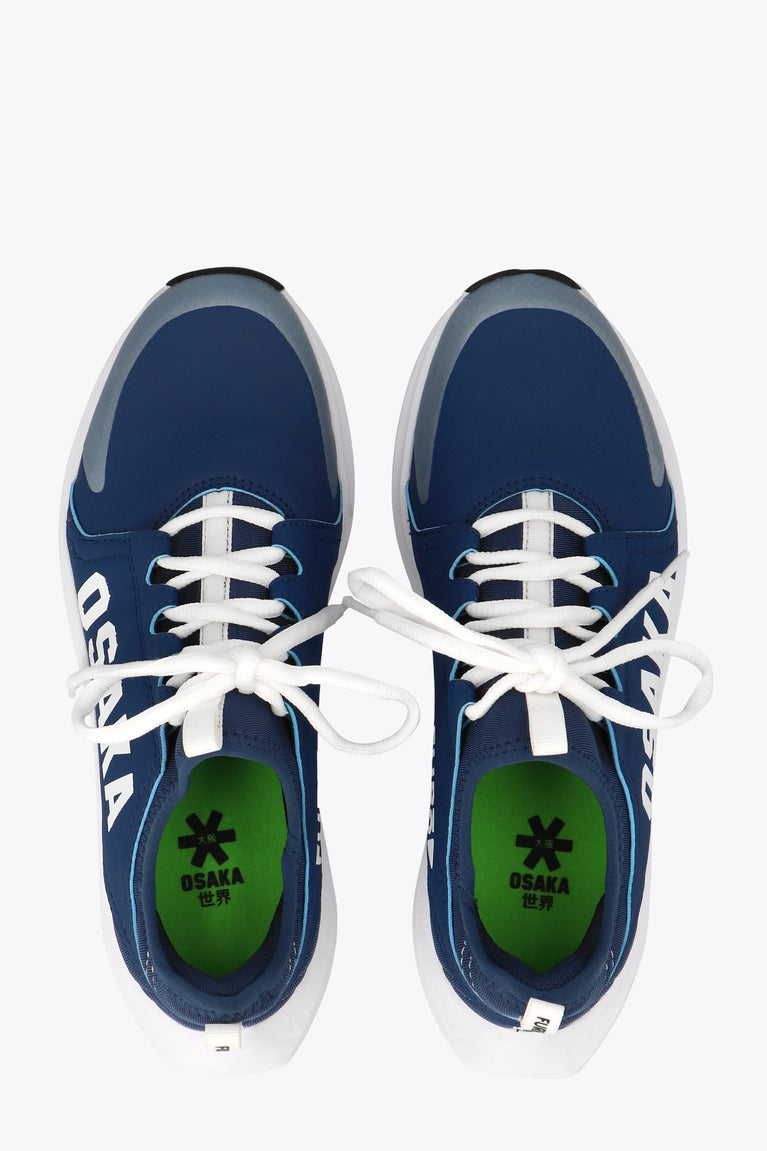 Osaka kids footwear in estate blue with logo in white. From above view