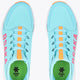 Light blue sneaker with orange lace accents and OSAKA branding at the insole
