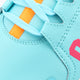 Light blue sneaker side with orange square eyelets, orange laces, and pink logo