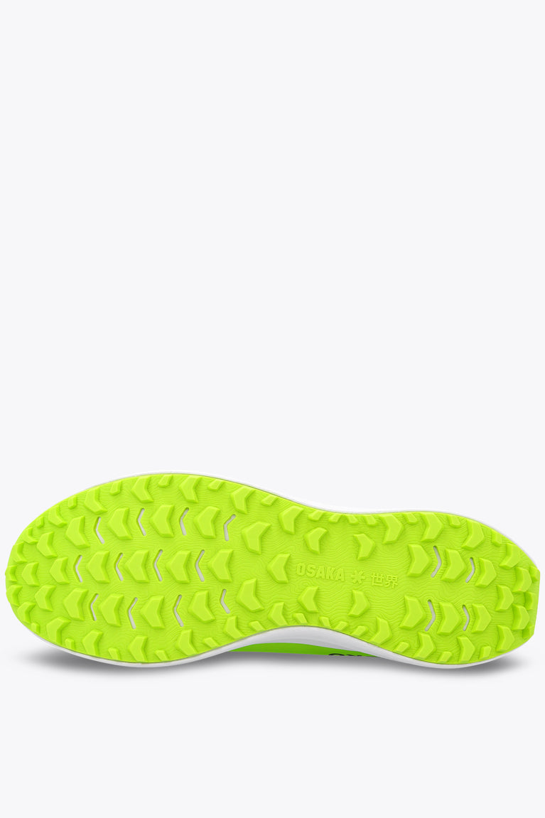 Neon lime sneaker outsole with tread pattern and white midsole edge