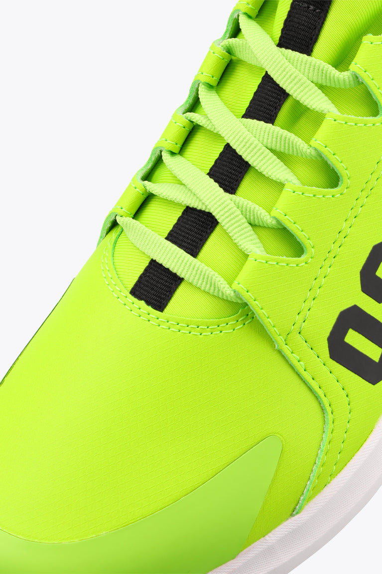 Neon lime sneaker upper with black lace accents and stitched panels