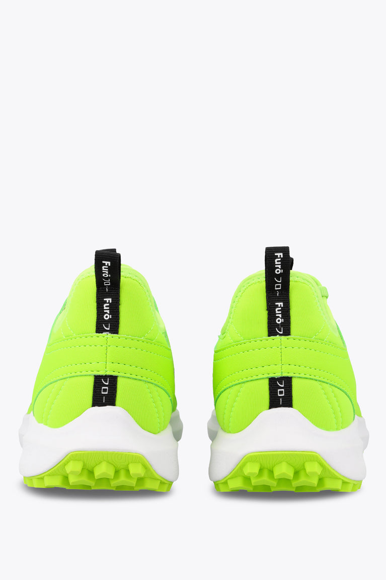 Neon lime lace-up sneakers with black tongue label and white rubber sole