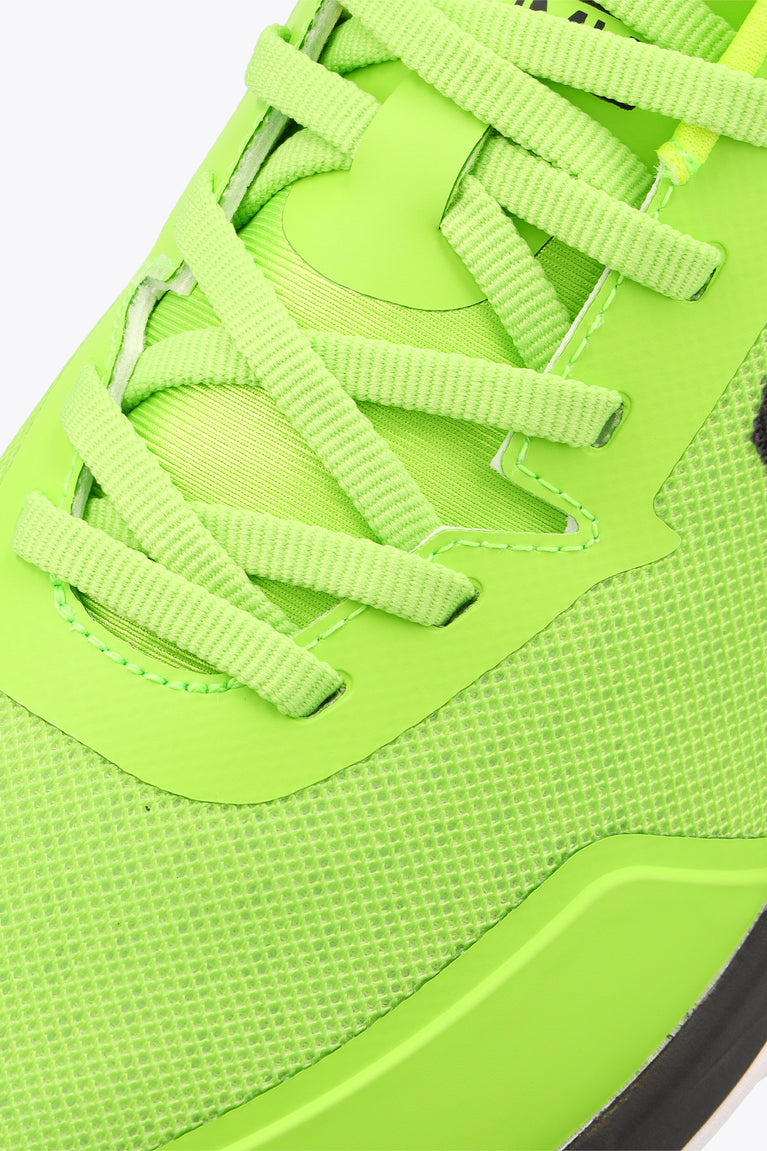Lime green mesh upper with laces and stitched overlays