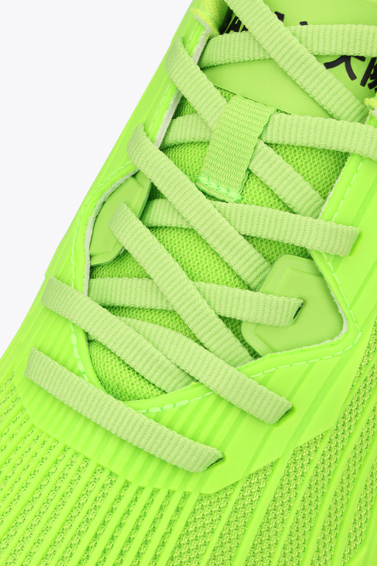 Neon green mesh upper with woven laces and padded collar