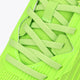 Neon green mesh upper with woven laces and padded collar