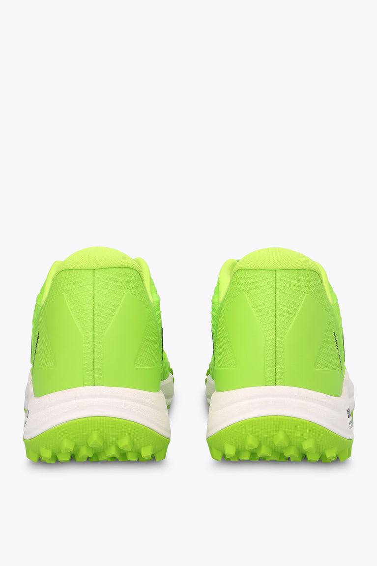 Neon green back view sneakers with white heel stripe and studded outsole