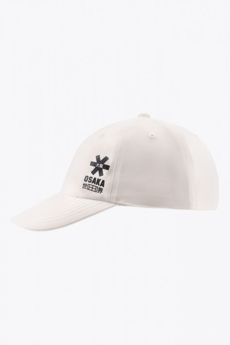 Osaka baseball cap soft in white with logo in black. Side view