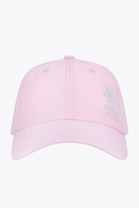 Osaka baseball cap soft in pink with logo in white. Side view