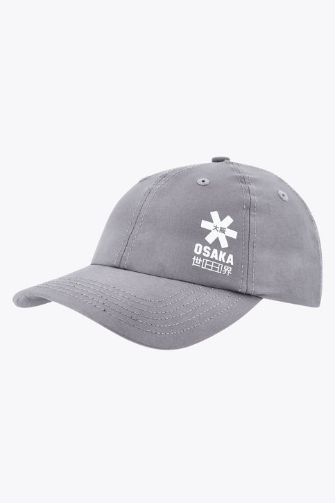 Osaka baseball cap soft in grey with logo in white. Side view