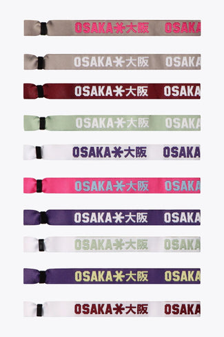 Farbarmband Mix A collection of Osaka woven bracelets in various colors, each featuring the text 'OSAKA 包吩工' on them.
