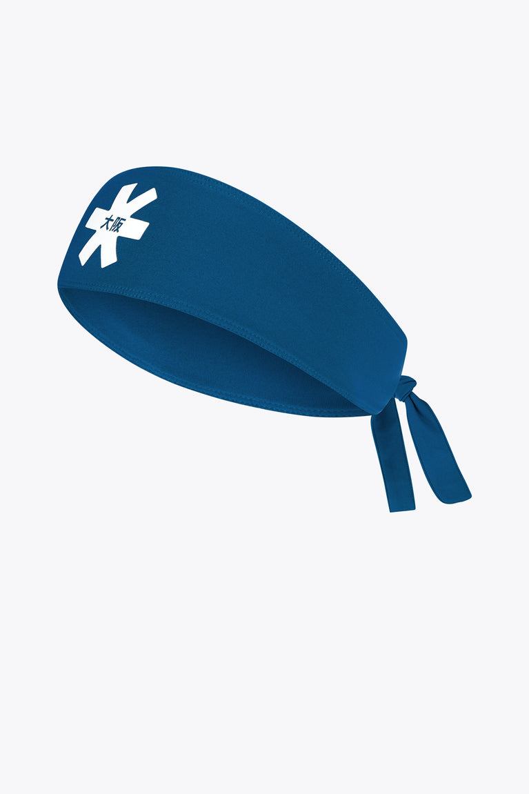 Blue sports bandana with bow tie and small white emblem on front