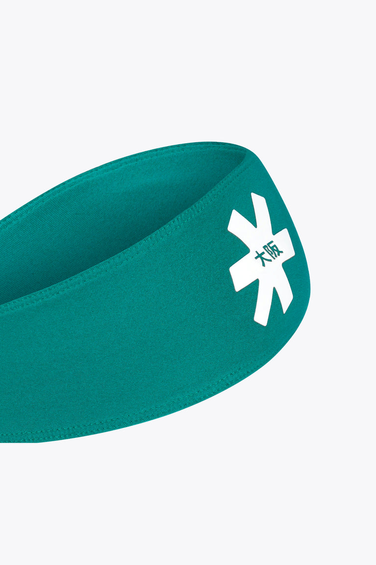 Osaka sports bandana close-up of teal-green logo patch on side