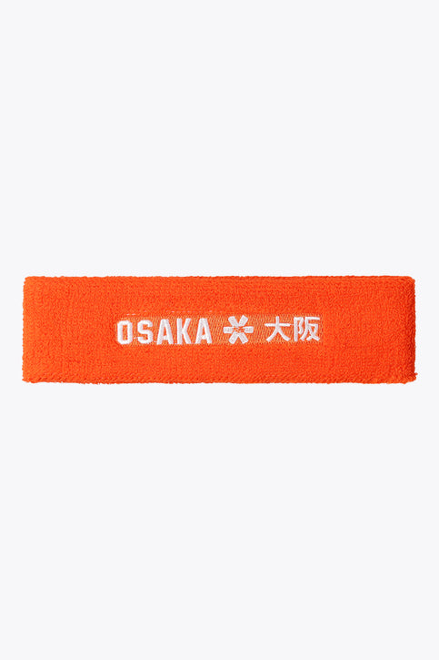 Orange sweatband with Osaka logo and lettering on front