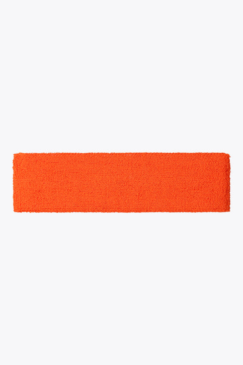 Orange sweatband with Osaka logo and lettering on front