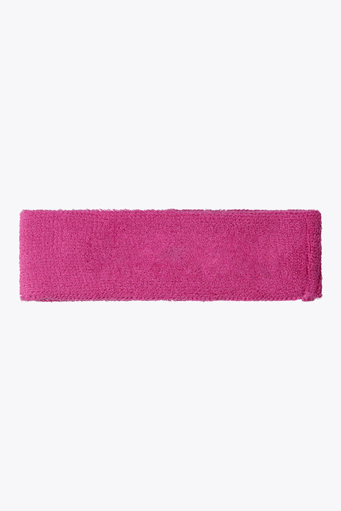 Rose Bud Osaka sweatband in magenta with white logo text