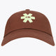 Peppercorn twill baseball cap with green embroidered logo on crown