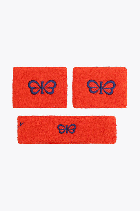 Bright orange sweatband set with blue bow-style logos on three terry straps