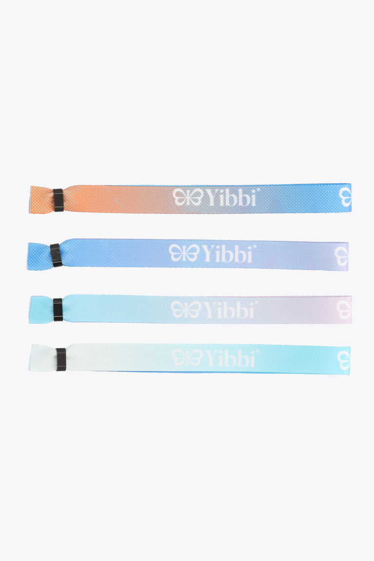 Set of multicolor fabric bracelets with Yibbi print and elastic loop ends