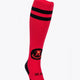 Castelldefels Field Hockey Socks in red with Osaka logo in green. Front view