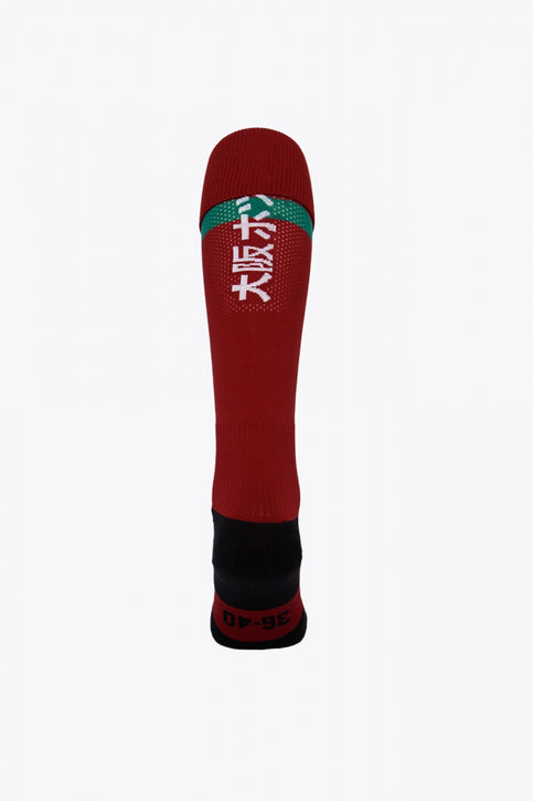 Cannock Field Hockey Socks in bordeaux with Osaka logo in green. Front view