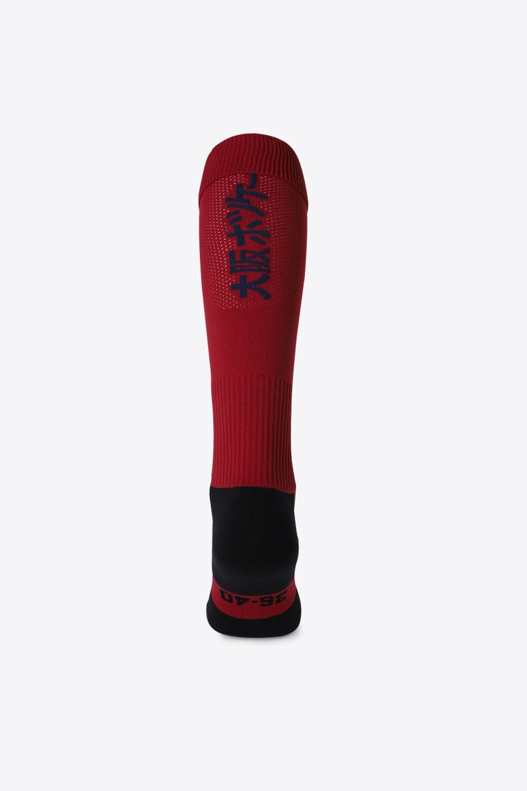 Herakles Field Hockey Socks in bordeaux with Osaka logo in green. Back view