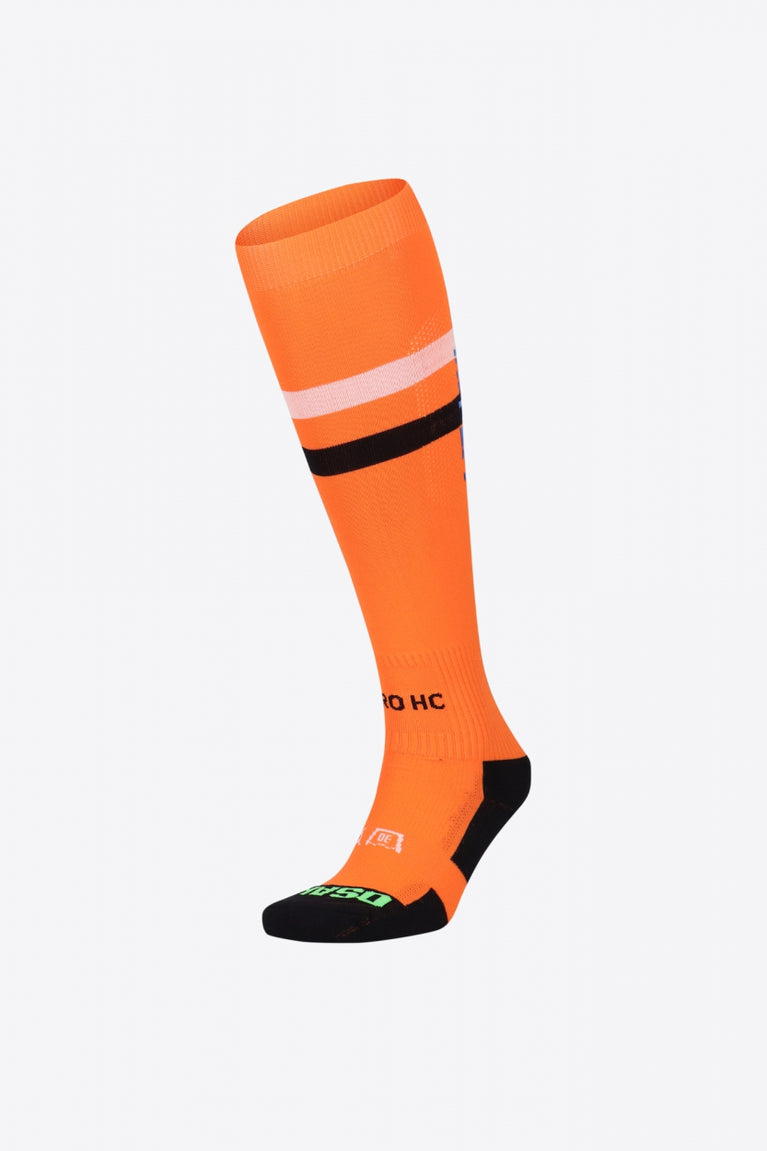 Iluro Field Hockey Socks in orange with Osaka logo in green. Front view