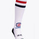 Luxembourg Field Hockey Socks in white with Osaka logo in green. Front view