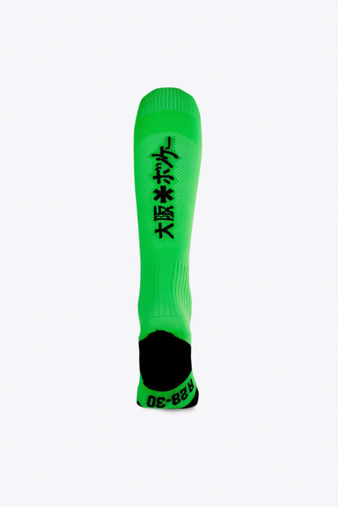 Osaka Field Hockey Socks fluo green with Osaka logo in green. Front view 