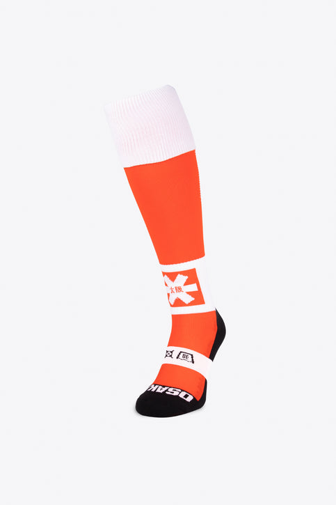 Osaka Field Hockey Socks orange with Osaka logo in white. Front view 
