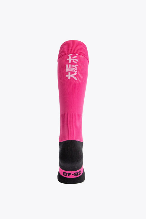 Osaka Field Hockey Socks in pink with Osaka logo in green. Front view