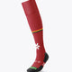 Red field hockey socks with yellow stripe and team logos, cushioned foot and ribbed leg