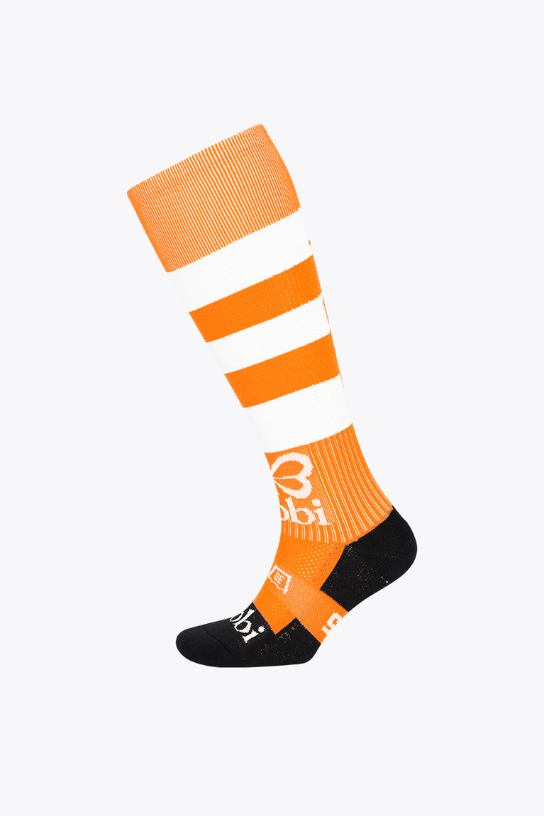 Orange field hockey crew socks with white stripes, orange graphic, and black heel