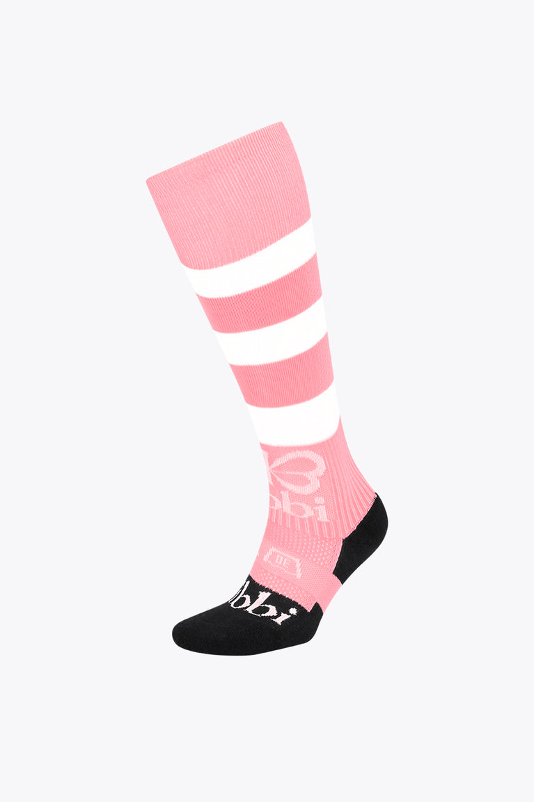 Pastel pink field hockey socks with white stripes and black toe