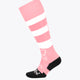 Pastel pink field hockey socks with wide white stripe bands and black toe