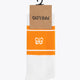 Orange and white sport socks on tag with Yibbi logo and flower emblem