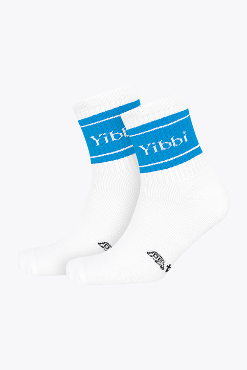 Light blue sport socks, ribbed crew style with Yibbi logo bands at the cuff