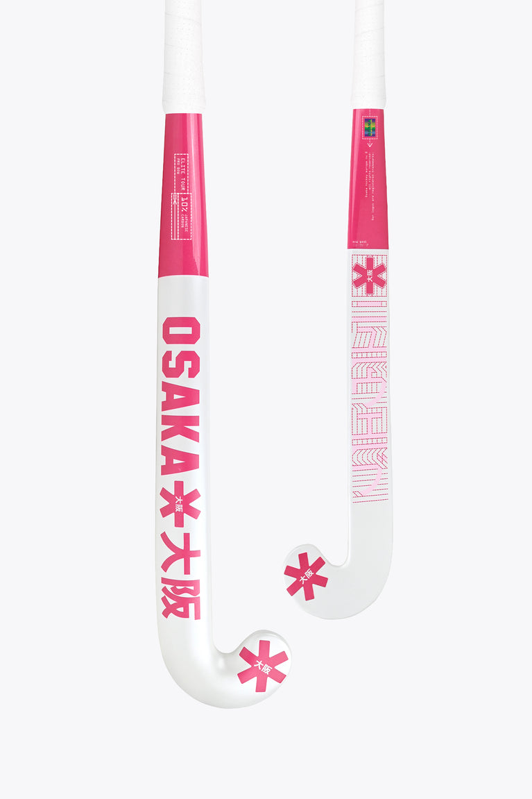 Raspberry field hockey stick with curved white head and pink grip details