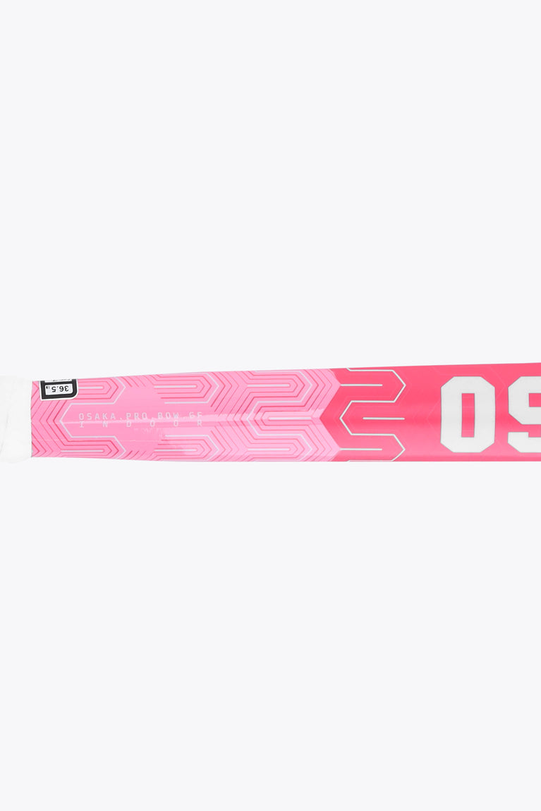 Hot pink indoor hockey stick shaft close-up with Osaka branding and circuit pattern